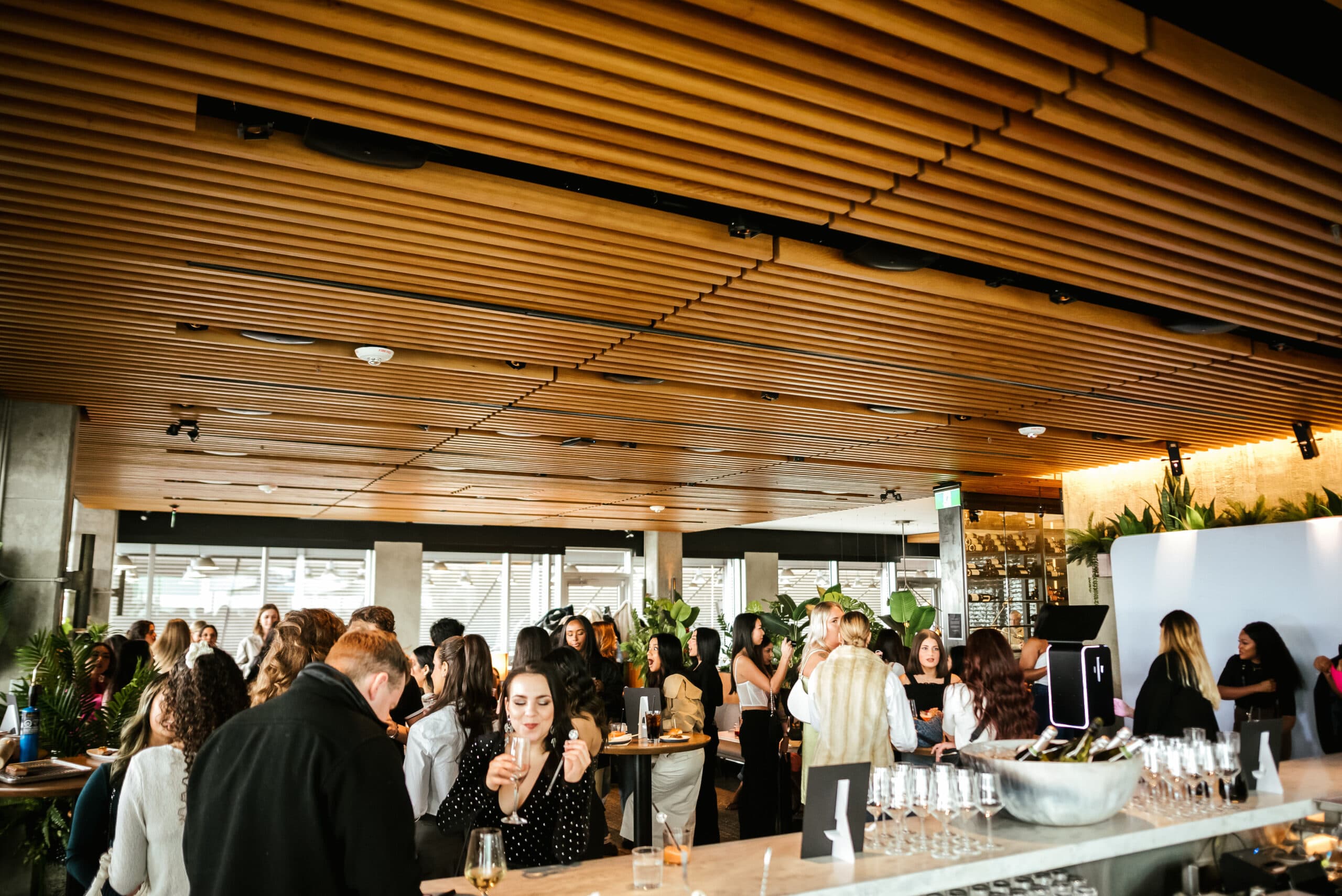 Busy restaurant interior with a private event